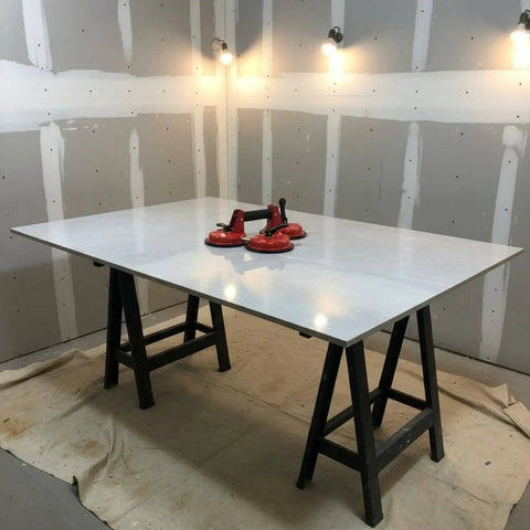 Heavy Duty Suction Glass Lifter For Big Panels With Reinforced Support on a work table, ideal for moving large glass safely.