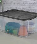 Heavy Duty 76 Quart Plastic Storage Bins With Snug Lids For Garage Organization Knock Out Messy Clutters With These Stackable Clear Base Gray Lid Totes filled with garden supplies