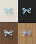 Blue Bow Dresser Knobs 4 Pack Small Decorative Cabinet Drawer Pull Handles mounted on varied wood and black surfaces