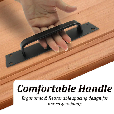 Hand using Two Pack Sliding Barn Door Handle Set In Black 7.9 Inch Aluminum Alloy Door Pull on wooden surface