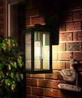 Two Pack Outdoor Wall Lanterns Black Sconce Lights With Clear Glass Shade Waterproof Wall Mount E26 Socket Modern Anti Rust Porch Lighting Bulb Not Included, mounted on brick wall with plant nearby