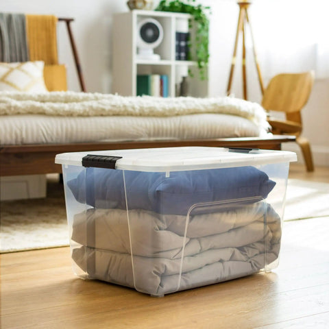 Straight Up Heavy Duty Clear Storage Bins Secure Snap Closure Stackable Plastic Totes For Bulky Seasonal Gear 60 Quart Capacity 22 X 16 X 12 Inches 2 Pack with blankets inside.