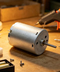 Top Shelf 24Mm RF-370CA DC Motor Goes Off At 12000RPM For Every Slick DIY Build Or Smart Lock Setup Runs Smooth On 6V To 12V With A Heavy Duty Metal Shaft on a workbench.