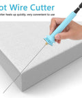 Hand using Hot Wire Foam Cutter Pen 30W High Power Foam Cutting Tool with Adjustable Voltage on Styrofoam block