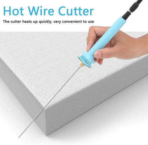 Hand using Hot Wire Foam Cutter Pen 30W High Power Foam Cutting Tool with Adjustable Voltage on Styrofoam block