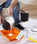 Top Shelf Paint Roller With Removable Sleeve For Smooth As Butter Wall And Ceiling Coat Zero Grind Handle in use with paint tray