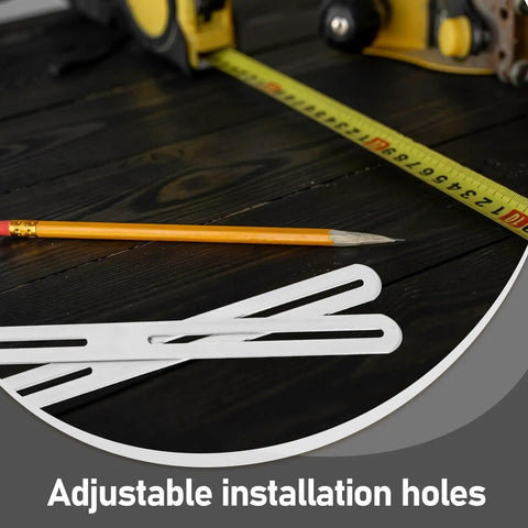Stainless steel slotted hole repair plates with screws dualhead adjustable table brackets on dark wood surface with pencil and tape measure.