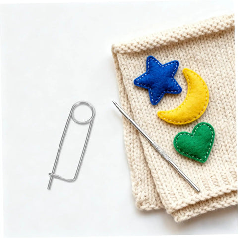 Heavy Duty Stainless Steel Locking Clamp Pins For Machinery Automotive Aerospace on a knit fabric with colorful felt shapes.