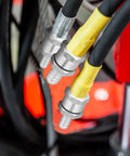 inline fuel check valves set attached to yellow and black hoses
