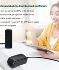 Person using No Fuss 24V 1A Power Supply Adapter 100-240V AC to 24V DC Switching Converter with electronic devices nearby