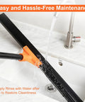 Pro Grade Heavy Duty Floor Squeegee With Long Handle, 18 Inch Rubber Blade being rinsed under tap