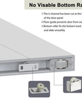 Close-up of concealed bottom track and roller system for 36 by 84 Inch Concealed Sliding Barn Door Featuring Frosted Glass Panels and Hidden Hardware to Keep Your Walls Dang Clean