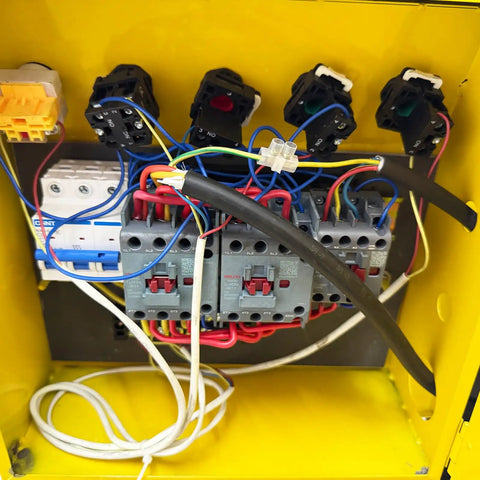 Inside view of electrical panel for Heavy Duty Rebar Straightening And Cutting Machine For Job Sites, showcasing wiring and components.