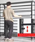 Rock Solid Commercial Fabric Roll Storage Rack Featuring Adjustable Hanging Bars For Wallpaper Linen Setup Plus Hella Sturdy Steel Frame Top Tier Workshop Organizer shown in use with adjustable bars.
