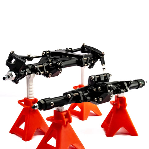 CNC Aluminum Front Straight Axle Kit for 1/10 Scale RC Crawlers, black anodized hubs, on red stands, for Optic RTR Crawler.