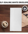 White Self Seal Confidentiality Envelopes 115mm By 225mm For Office Documents And Shipping on wooden desk