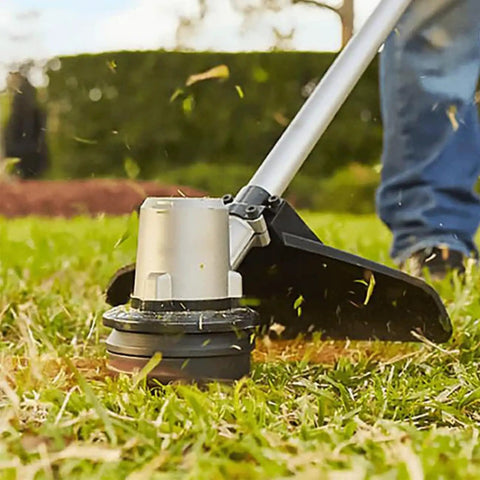 AH1300 Replacement String Trimmer Head For Ego Power Plus ST1500 Series 15 Inch Trimmers in use cutting grass