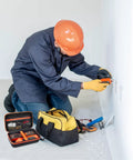Technician using Tough As Nails Case For Klein Tools ET310 AC Circuit Breaker Finder And Integrated GFCI Outlet Tester with tools.