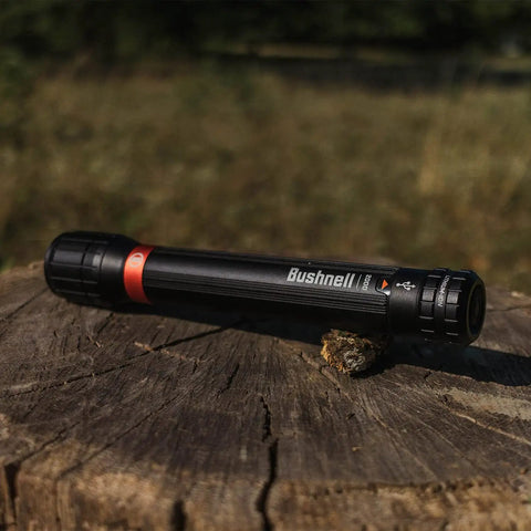 Beefed Up 2000 Lumen Rechargeable Flashlight For Outdoor Adventures With Crazy Long Battery Life, on a tree stump outdoors