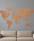 Self Adhesive World Map Wall Chart 39.3 By 18 Inches Lightweight Pinnable Travel Map With 10 Push Pins on a living room wall