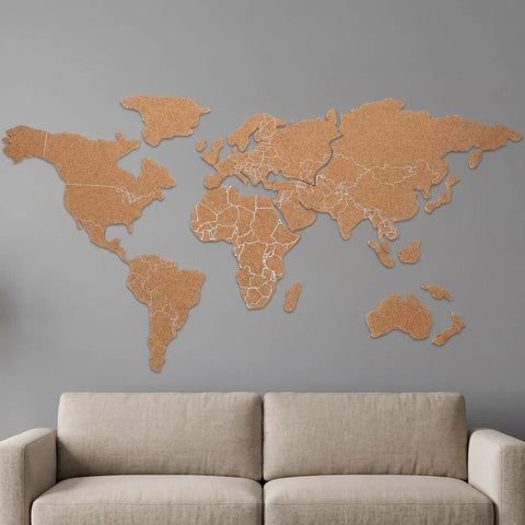 Self Adhesive World Map Wall Chart 39.3 By 18 Inches Lightweight Pinnable Travel Map With 10 Push Pins on a living room wall