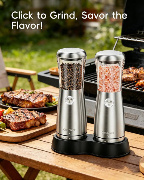 Sleek Stainless Steel Electric Salt And Pepper Grinder Set With Led Light, Adjustable Coarseness, Rechargeable Battery, Storage Base, Premium Automated Spice Mill For Modern Kitchen Gadgets on a picnic table.