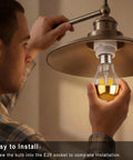 Man installing Half Chrome Gold Tipped LED Filament Bulbs Dimmable A19 6W 60W Equivalent Warm White 2700K E26 Base
