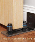 Black Floor Guide And Bottom Wall Guide Set For Barn Doors With Flush Design Flat Bottom Stay Roller installed on wood floor