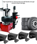 Image showing a tire changer machine with Universal Tire Machine Jaw Protectors 4 Pack Rim Guard Covers For Tire Changers.