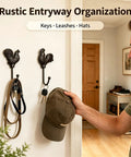 Vintage Cast Iron Rooster And Hen Wall Hooks Bring A Sick Farmhouse Vibe To Your Mudroom Kitchen Or Entryway With These Gutsy Decorative Hooks Adding Real Country Charm While Keeping Hats Bags Towels And Keys In Place Total Must Have Item, showcasing mounted hooks with leashes and keys.