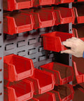 Built Like A Tank Industrial Storage Cabinet with 144 red plastic sorting bins, user organizing tools on shelves.