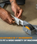 Person adjusting Heavy Duty Universal Mobile Tool Base With 3 Inch Non Marking Wheels, 650 Lb Capacity on floor