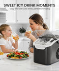 Portable Countertop Ice Maker That Makes Bullet Ice Pretty Dang Fast With Zero Fuss And Self Cleaning Features Providing Two Cube Size Choices For House Parties Producing 26 Pounds Daily In Modern Black with family enjoying drinks.