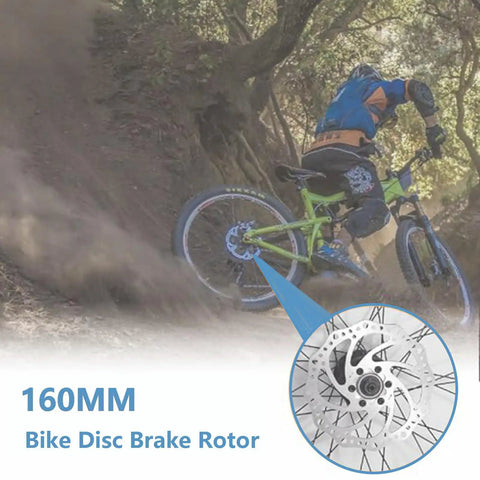 Cyclist on trail illustrating 160mm Stainless Steel Bike Disc Brake Rotor for Road and Mountain Bikes Beefy Stopping Power