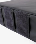 Close-up of the rugged exterior of Trasher Vehicle Trash Can For Cars And Trucks, Rugged Modular Utility Bag With Waterproof Lining.