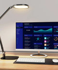 LED Desk Lamp With Eye Care Diffused Light, 3 Color Temperatures And 10 Brightness Levels, on a desk next to a monitor