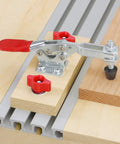 Top Tier Heavy Duty Aluminum T Track Rail 48 Inches Long For Woodworking Jigs And Shop Fixtures Bolt Down Bench Mount With Fire Grip Hex Nuts For Dead Nuts Clamp Hold And Straight Up Precision Assembly with a red clamp and knobs