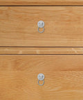 Vintage Flower Drawer Pulls, 4-Piece Set, 36mm Antique White Nickel Finish on wooden dresser drawers