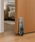 Two Pack Low Profile Rubber Casters Smooth Roll Door Support Wheels Side Mount Furniture Gliders on wooden door.