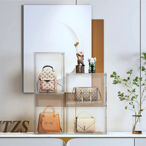 Clear Acrylic Handbag Organizer Set, 3 Pack Stackable Display Boxes With Magnetic Door For Purses Wallets And Collectibles, shown with purses.
