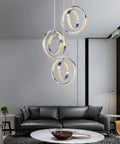 Sleek Modern LED Chandelier With Six Ring Chrome Pendant Light, Dimmable 18W Ceiling Fixture in modern living room setting