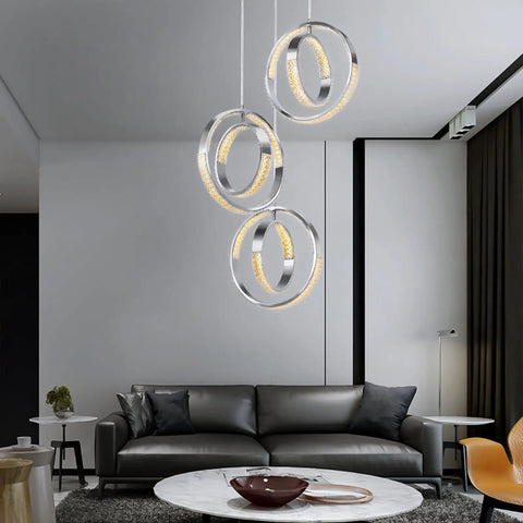 Sleek Modern LED Chandelier With Six Ring Chrome Pendant Light, Dimmable 18W Ceiling Fixture in modern living room setting