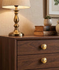 Handmade Solid Brass Cabinet Knobs Round Unlacquered Drawer Pulls Developing Rich Antique Patina Over Time on wooden dresser.
