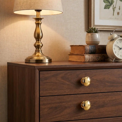 Handmade Solid Brass Cabinet Knobs Round Unlacquered Drawer Pulls Developing Rich Antique Patina Over Time on wooden dresser.