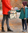 Woman holding Insulated Lunch Tote Bag With Shoulder Strap For Teens, Students, Women And Men, Reusable Portable Lunch Box.