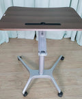 Legit Sturdy Height Adjustable Laptop Desk With Quick Pneumatic Lift ball bearing casters, brown top, compact design, ideal for home office use.
