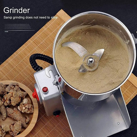 Top view of 800G High Speed Electric Stainless Steel Grain Grinder And Pro Grade Crusher for home use with visible ground powder inside.