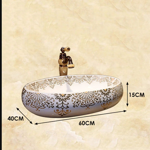 Slick Oval Ceramic Bathroom Sink For Countertop Vanity Rock Solid Above Counter Style With Pop Up Drain No Overflow Easy Setup Knockout Look For Small Half Baths And Daily Home Refreshers, 60x40cm with decorative gold pattern.