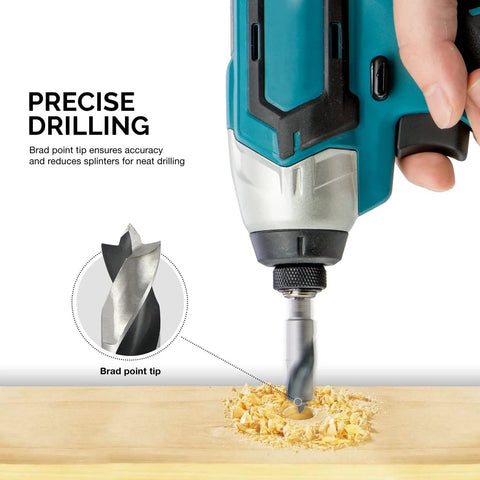 Side view of a cordless drill with a brad point drill bit drilling into wood; close-up of brad point tip
