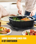 Large silicone liner in use for 4-qt container with food, people serving salad and meat, kitchen setting